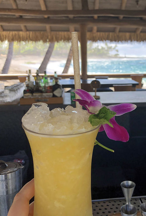 A craft cocktail served at the Talk Story Bar on the beach.