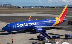 Southwest will retrofit its planes to add extra-legroom seats.