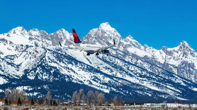 A Delta plane serving Jackson Hole passes the Grand Tetons.