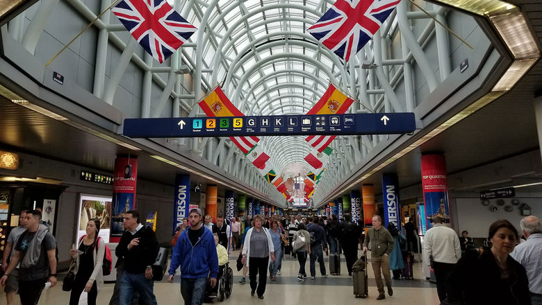 Flyers at Washington Reagan National Airport. Eight airlines are duking it out for the five additional daily roundtrip slot pairs that the DOT is authorized to award for flights beyond the 1,250-mile perimeter at the airport.