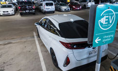 An electric vehicle charging station at Dallas-Fort Worth Airport.