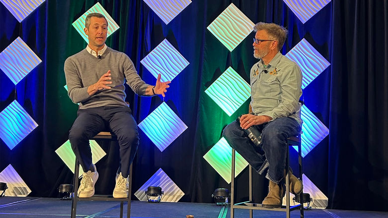 Alterra CEO Jared Smith (left) speaks with Colorado Sun reporter Jason Blevins at the Mountain Travel Symposium.