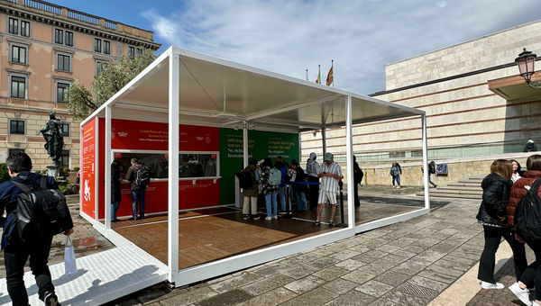 An information booth outside of the Venezia Santa Lucia train station to assist travelers on how they can pay the entrance fee.