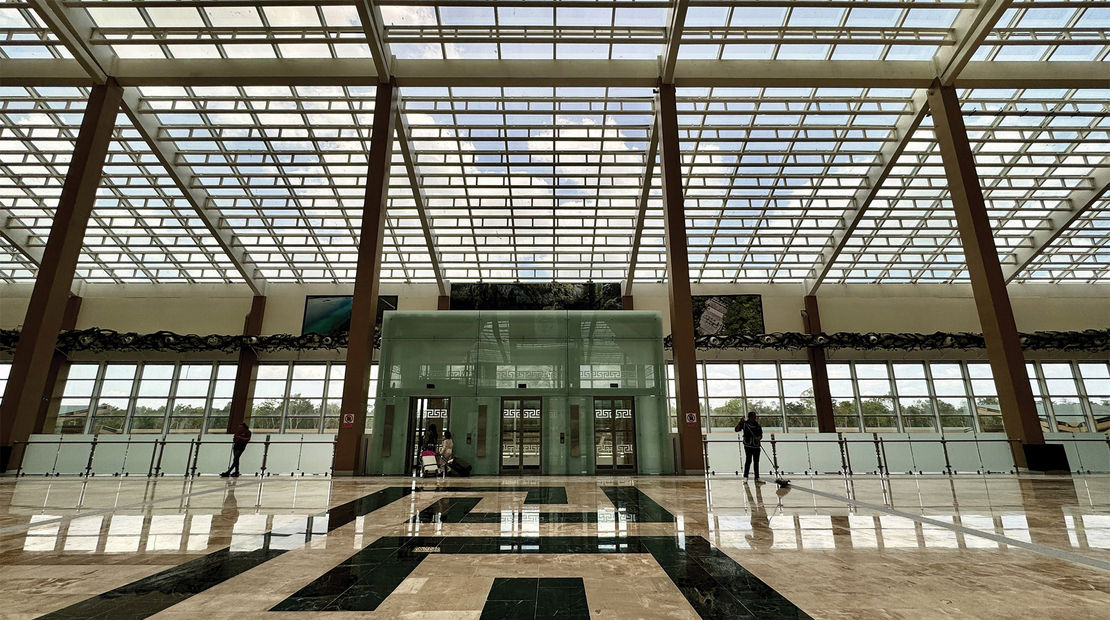 The new Tulum International Airport features lofty glass ceilings that allow in a lot of natural light.