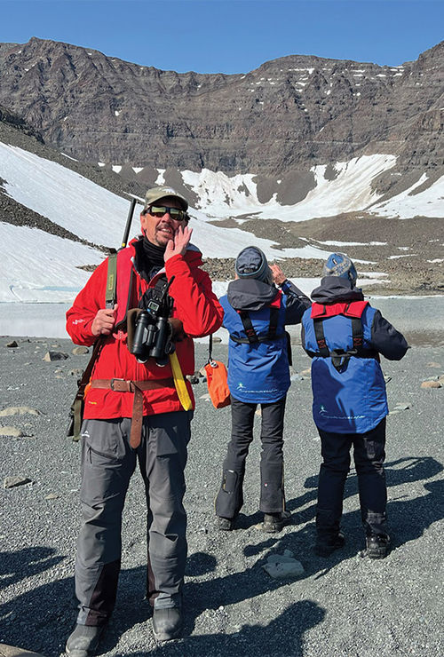 Expedition leader Howard Whelan overseeing a landing on the east coast of Greenland.