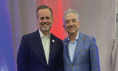 Fred Dixon, while still CEO of New York Tourism & conventions, and his predecessor at Brand USA, Chris Thompson, at the IPW conference in Los Angeles in May.