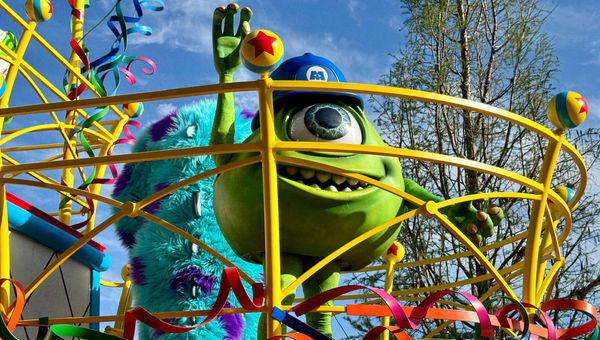 In the finale of the Better Together parade, Mike Wazowski of "Monsters, Inc." waves to the crowd.