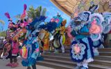 Musicians and dancers in a Junkanoo celebration on Disney's Lookout Cay at Lighthouse Point.