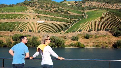 AmaWaterways guests view the Portuguese countryside from the deck of the AmaVida.