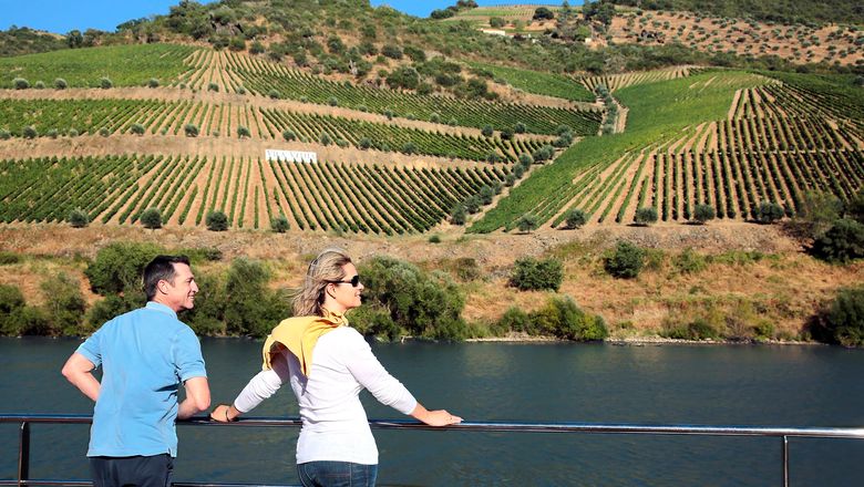 AmaWaterways guests view the Portuguese countryside from the deck of the AmaVida.