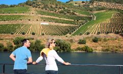 AmaWaterways guests view the Portuguese countryside from the deck of the AmaVida.