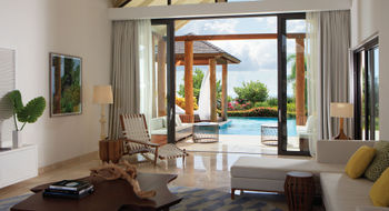 The interior of a top-tier accommodation at the InterContinental Dominica Cabrits Resort & Spa.