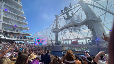 Passengers on the Utopia of the Seas preview cruise dance to a set by Rev Run and DJ Ruckus at the ship’s naming ceremony.