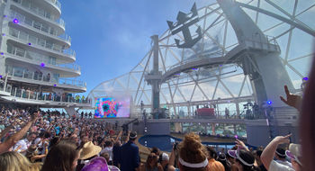 Passengers on the Utopia of the Seas preview cruise dance to a set by Rev Run and DJ Ruckus at the ship’s naming ceremony.