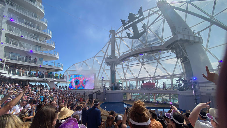 Passengers on the Utopia of the Seas preview cruise dance to a set by Rev Run and DJ Ruckus at the ship’s naming ceremony.